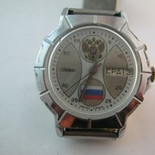 Russian watch Slava. Vintage mens watch the coat of arms of Russia