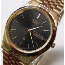 Citizen Men's Quartz Gold Dual Calendar Watch w/ Bracelet