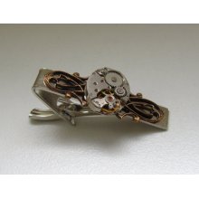 Steampunk Tie Clip with the smallest oval vintage watch movement . Vintage upcycled mens Tie Tack, Industrial chic, Gift under 30 Dollars