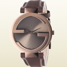 interlocking watch large brown PVD case with brown leather strap...
