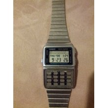 1980s Casio Vintage Rare Data bank calculator Watch and it works silver tone DBC-610
