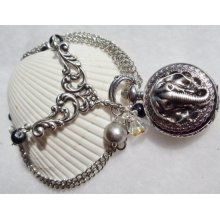Elephant pocket watch pendant, silver watch pendant featuring elephant head on front watch case.