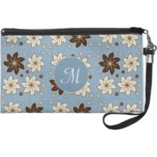 Floral design on blue Wristlet