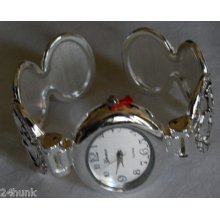 Ladie's Geneva Silvertone Bracelet Watch With Cross & Heart & Scroll Detail