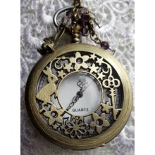 Pocket watch pendant, features assorted charms and glass beads on antique bronze chain