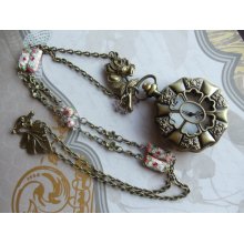 Pocket watch pendant, watch pendant in antique bronze featuring roses on chain and watch with mauve cloisonnÃ© beads and Swarovski crystals