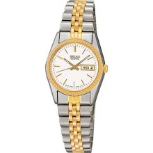 Seiko Ladies Dress Watch W Gold-tone Accents And Round Dial - Swz054