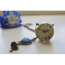 Round Glass Pocket Watch Necklace on Antiqued Bronze Chain with a Blue Stone