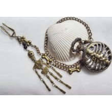Skeleton pocket watch, steampunk style watch with ribs on front case and chain with skeleton chain