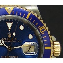 ROLEX - 18kt Gold & Stainless Submariner 40mm - Blue Index Dial - 16613
