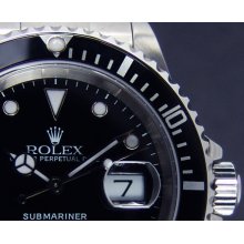 ROLEX - 40mm Stainless Steel Submariner - Black Index Dial - 16610