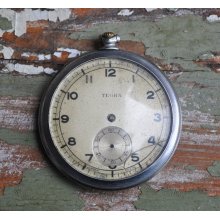 Antique pocket watch case with movement and dial.TEGRA.