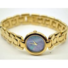 Ladies Seiko Quartz Yellow Goldtone Watch With Blue Pearl-like Face