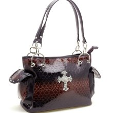 Rhinestone cross accented snake skin embossed shoulder handbag