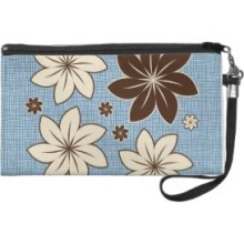 Floral design on blue Wristlet Clutches