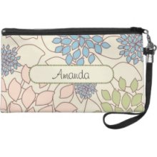 Floral patterns design . Add your name on the Wristlet Clutch
