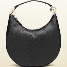 Gucci 'GG twins' medium hobo with interlocking G details.