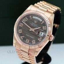 Rolex 18k rg day date wave ref 118235