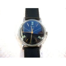 Vintage Pobeda mechanical mens watch with roman numbered dial