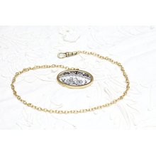 Black and White Oval Gold Tone Pendant Single Gold Tone Chain Watch Fob