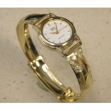 Lady's Q&q Yellow Tone Gold Plated Bangle Watch White Dial Frosted Finish Quartz
