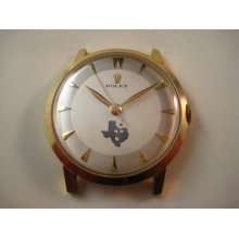 Rolex vintage 14k Dress model circa 1970's.Original cool Rolex logo dial. Mechanical wind 17 jewels. A 20 year award watch.