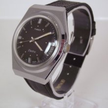 Vintage 1978 Timex Electric Retro Mens Wrist Watch in Silver Case W/Sweep Second Hand & Roman Numerals Black Leather Band