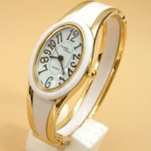 White Gold Oval Face Women's Bangle Bracelet Watch
