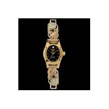 10K Watchband with Garnets and a Gold Plated Black Face