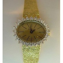 14 Karat Yellow Gold Geneve Diamond Watch