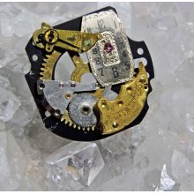 Beautiful recycled mechanical gold watch parts pin brooch steampunk found object jewelry fashion rubie art created in Michigan
