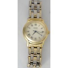 Guess Woman's Retro 1997 Watch Gold Tone Cream Dial Date Roman Numerals
