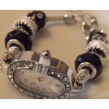 Charm style silver bracelet watch with black and white charm beads