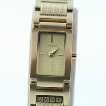 Ladies Dkny Model Ny4443 Dkny Logo Band Gold-tone Bracelet Watch 7