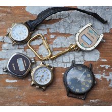 Set of 5 quartz wrist watches for parts or artwork.