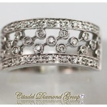 14kt. White Gold Cut Out Pattern Round Diamond Ring