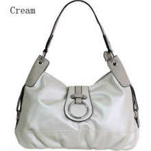 Decorative Silver Tone Hardware Accents. Medium Size Bag. Top Zip Closure