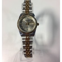 Ladies Swanson Classic Gray Dial Gold Silver Bracelet Day Date Rx Quartz Watch