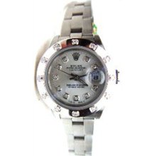 Rolex Unused 2005 with Rolex factory 12 Diamond Bezel