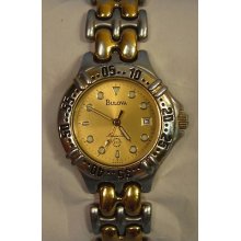 Vintage Bulova Quartz Two Tone Marinie Star Date Window Watch -running-