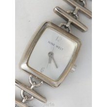 Nine West Woman's Silver Tone Watch Blue Stone Band Silver Dial