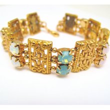 SALE Swarovski Crystal Golden Bracelet with Opals by Rivkasmom