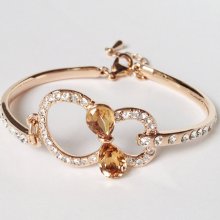 Sparkling Infinity Brandy Swarovski Crystal Bow 18K Rose Gold Plated Bangle