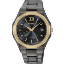 Seiko Men's Stainless Steel Solar Quartz Black Dial Gold Bezel SNE168