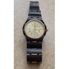 BAUME & MERCIER Gold And Stainless Steel Ladies Watch - Matte Black Band - Gold Face - 1980's Vintage Wristwatch - Swiss Made - Very RARE