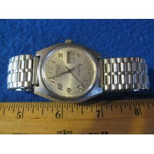 Caravelle Analog Quartz Stainless Steel Back Base Metal Bezel Watch