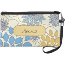 Floral patterns design . Add your name on the Wristlet Purse