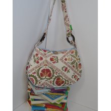 Pink and white floral patterned shoulder bag. Made by Anne.