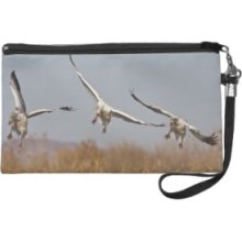 Snow Geese (Chen caerulescens) in flight 2 Wristlet Purses